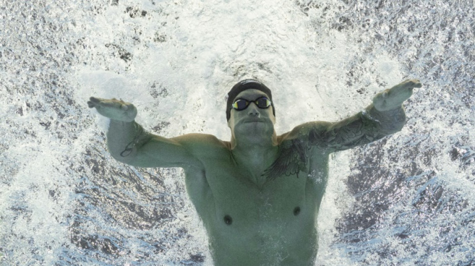 Dressel grabs 15th world gold as Santos sets age record