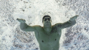 Dressel grabs 15th world gold as Santos sets age record