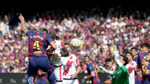 Araujo header scrapes Liga leaders Barcelona win over Rayo