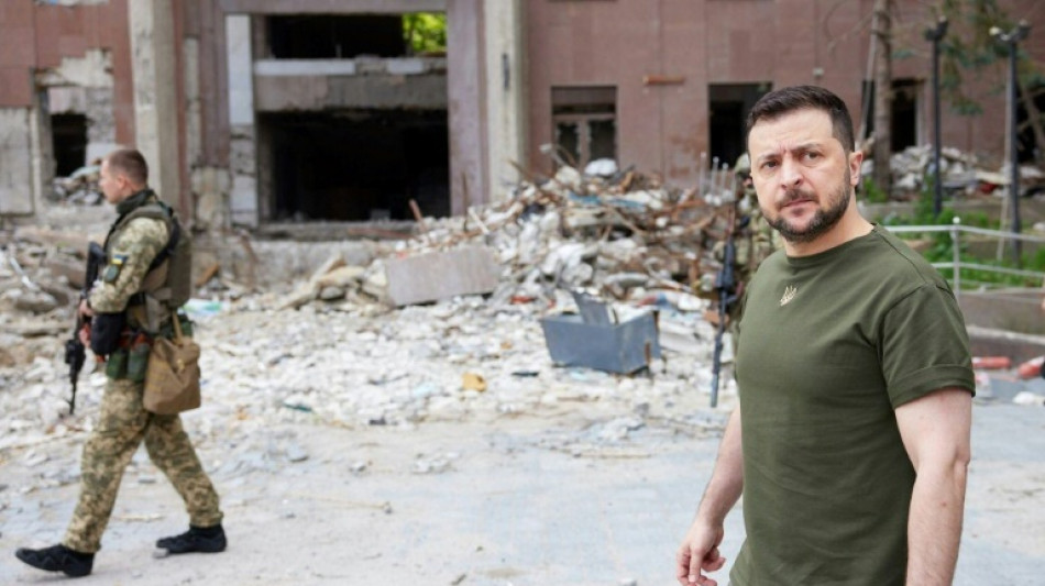 Zelensky vows to retake south, NATO warns of long war
