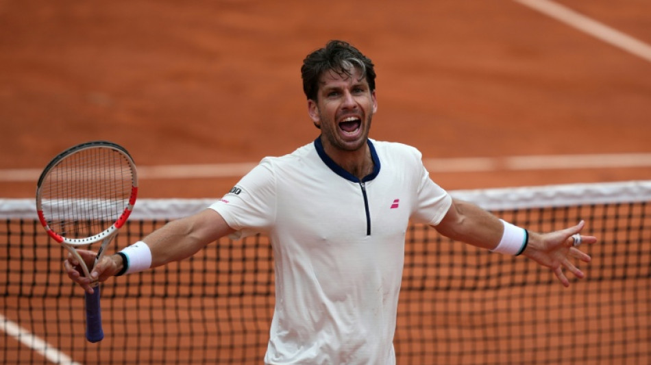 Norrie shocks Medvedev to reach French Open second round