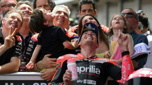 Aleix Espargaro scorches to pole in record time in Catalonia