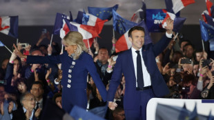 Macron seeks to heal French divisions after re-election