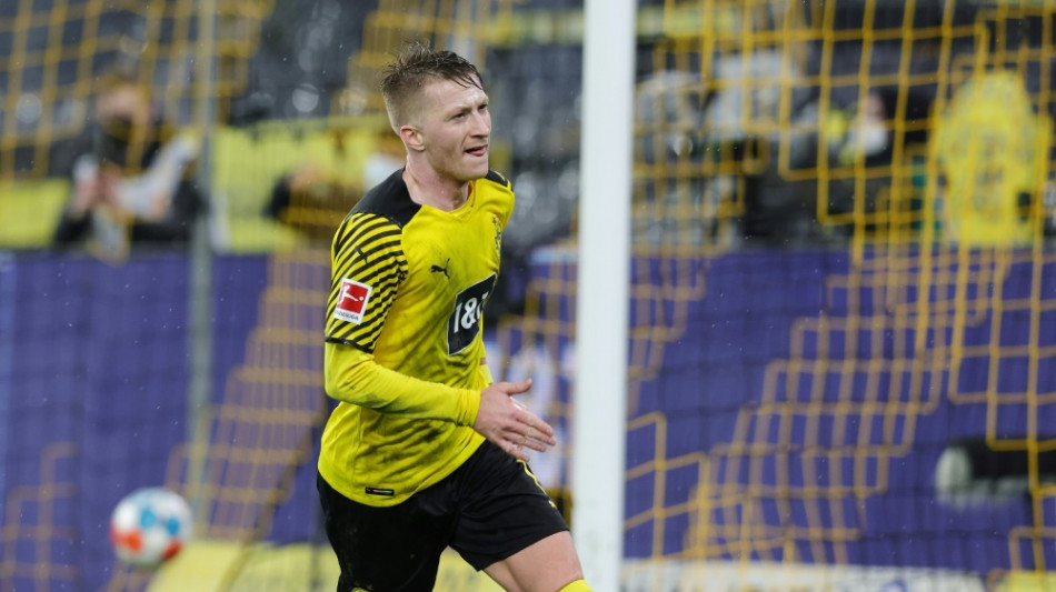 Überragender Reus im Sauwetter: BVB bleibt an Bayern dran