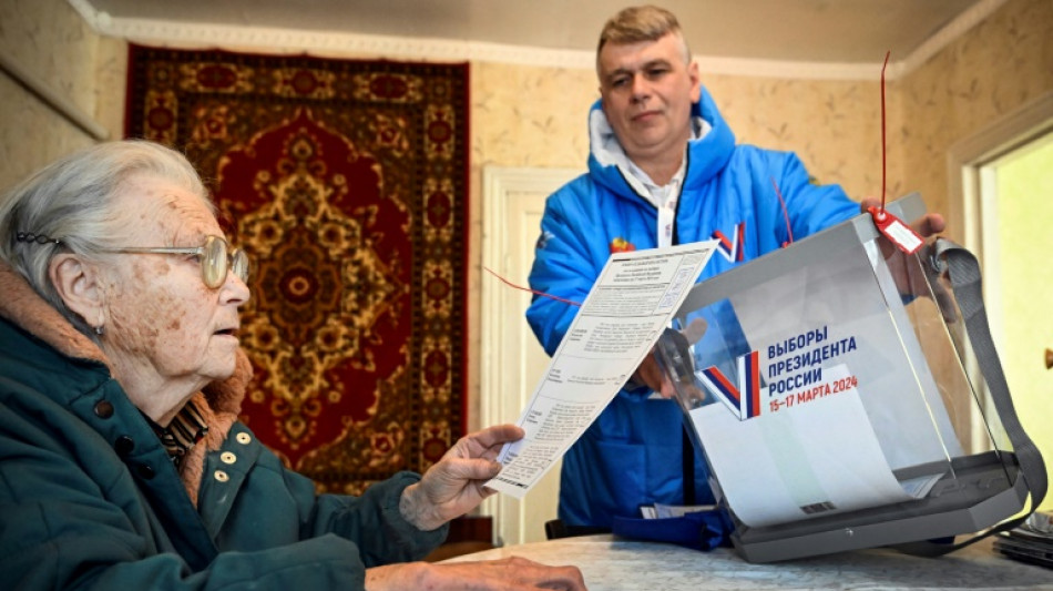 Pr&eacute;sidentielle sur mesure pour Poutine, avec l'Ukraine en toile de fond