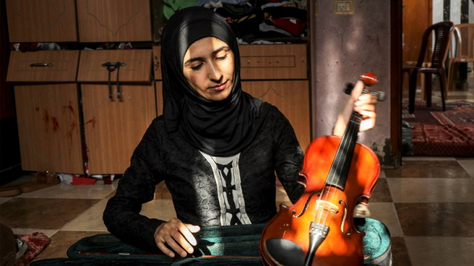 Cantar para tapar el estruendo de los bombardeos israel&iacute;es en Gaza