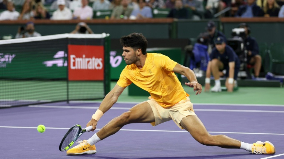 Alcaraz battles back to reach Indian Wells fourth round