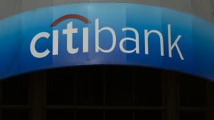 US banks see upheaval from Fed shift, Russia challenging economy