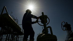 Oil spikes while stocks slip ahead of US Fed rate decision