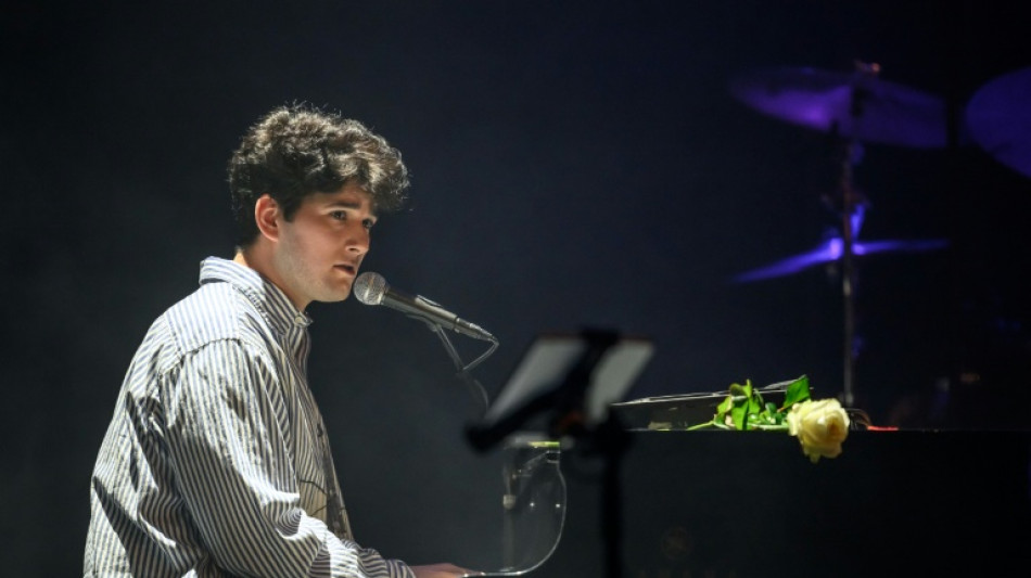 Tears and smiles at tribute concert for Swiss fire victims